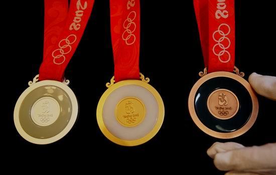 运动会金牌是纯金的吗