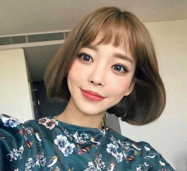 女生长脸适合短发吗