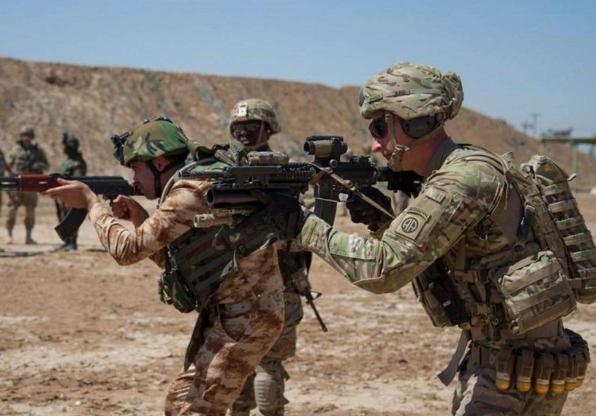 美国为什么要打伊拉克