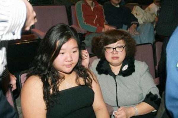 官晶华什么来头