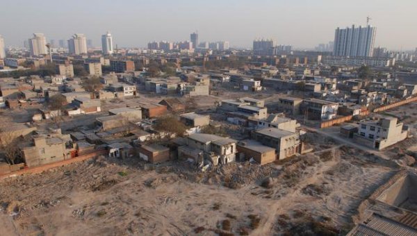 农村会合并村建楼房吗