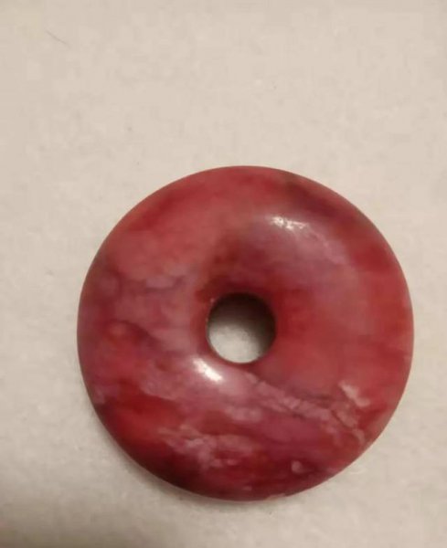 把玉石放在活羊腿里面再取出来