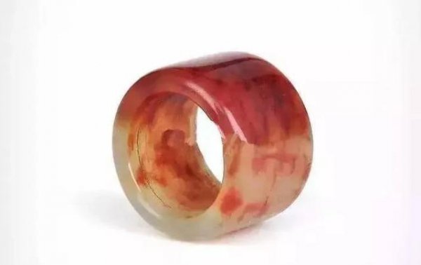 把玉石放在活羊腿里面再取出来