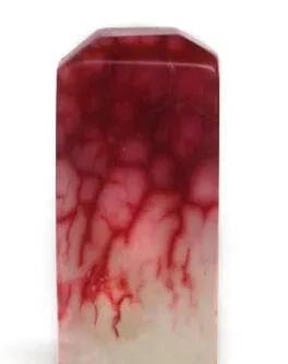 把玉石放在活羊腿里面再取出来