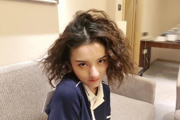 中国自来卷是什么血统