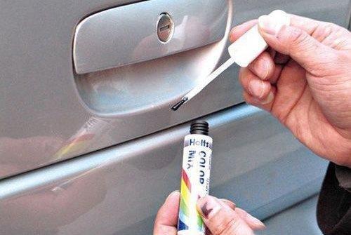 白色新车刮的露黑了要多少钱