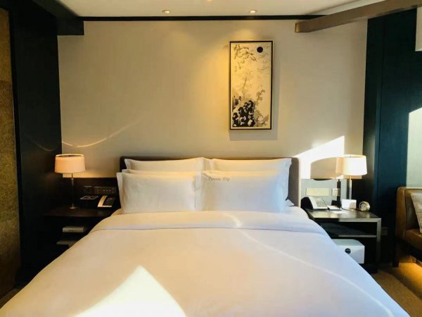 为什么酒店的被子又轻又暖和