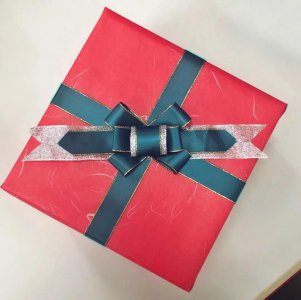 礼品盒蝴蝶结的打法教程 慢动作图解蝴蝶结系法步骤