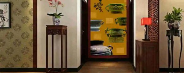 客厅对门的墙挂什么好