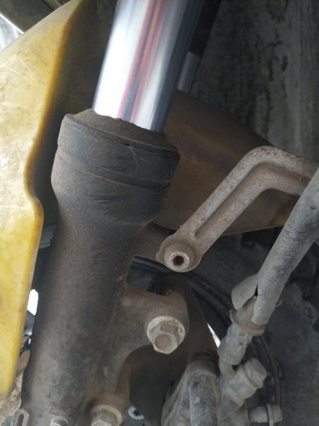 摩托车减震器漏油怎么修理图解