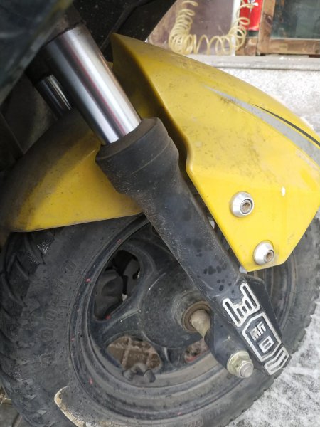 摩托车减震器漏油怎么修理图解