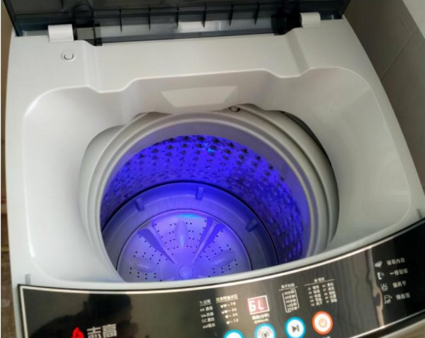 洗衣机洗桶光响不转咋回事