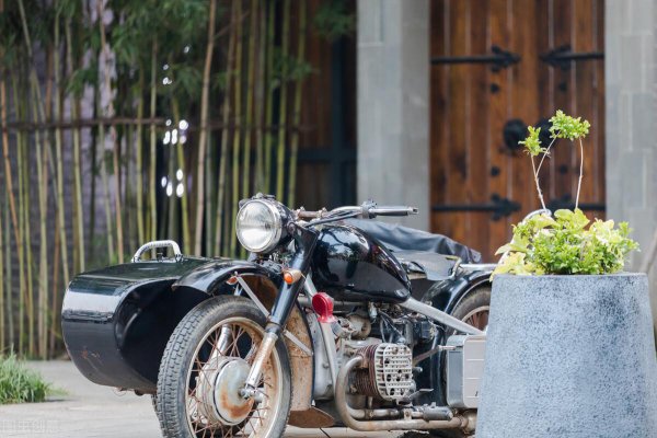 考摩托车考d还是e好