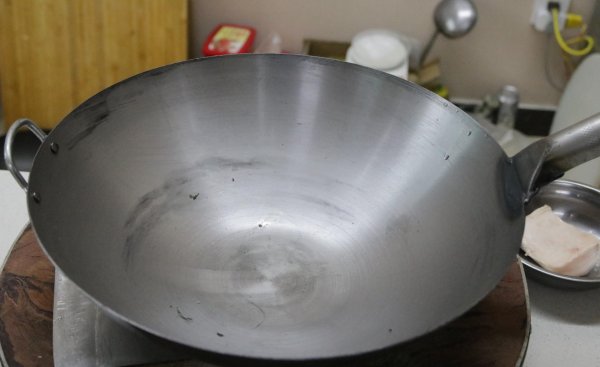 生铁锅好还是熟铁锅好