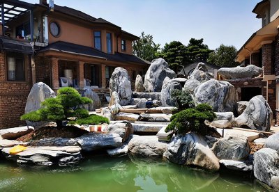 家庭人工养鱼池塘怎么建 如何在庭院选址并修建鱼池