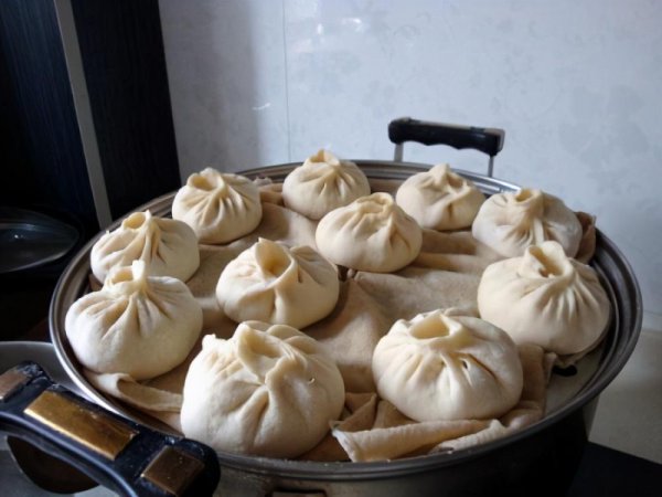 蒸包子为啥一掀锅就塌陷